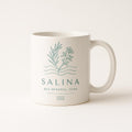 Sea blue and salt white ceramic mug with Mediterranean coastal design on a plain background