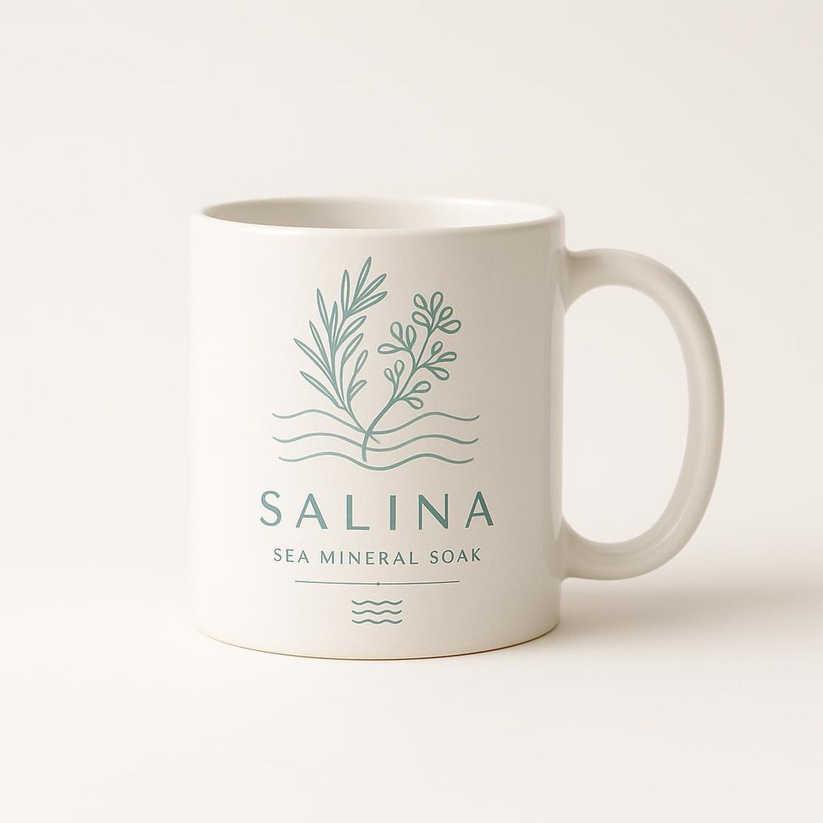 Sea blue and salt white ceramic mug with Mediterranean coastal design on a plain background