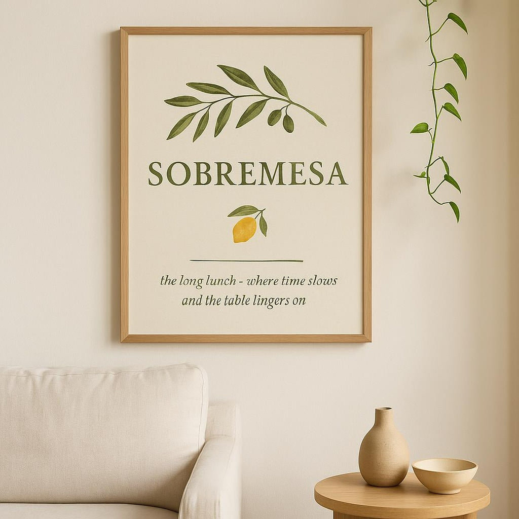 Lifestyle scene showing the carafe poster framed above a dining sideboard set for a long lunch
