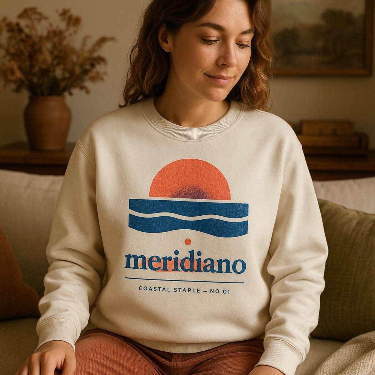 Model in the relaxed sweatshirt paired with linen trousers for scale and drape