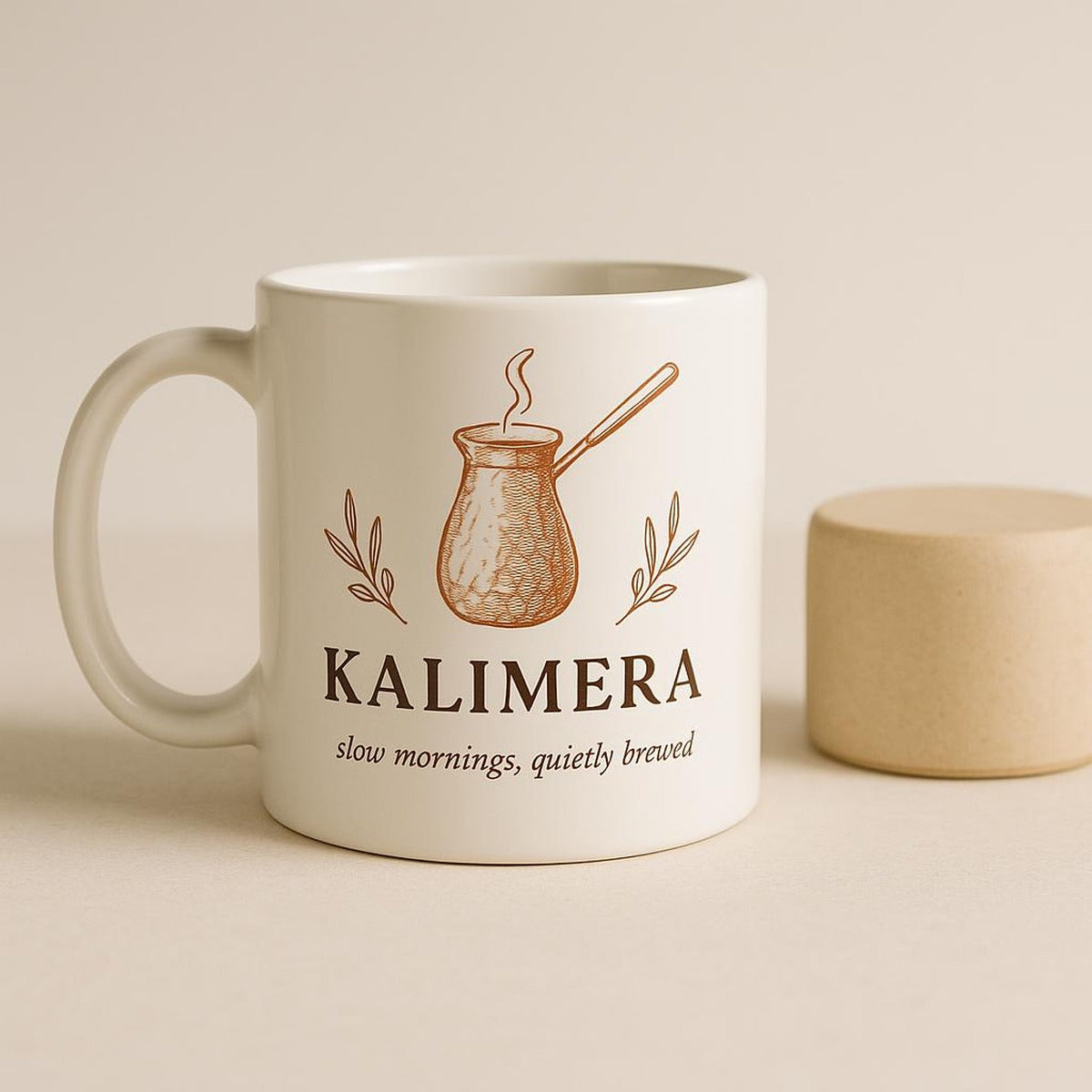 Hand holding the mug to show its comfortable rounded body and easy-grip handle
