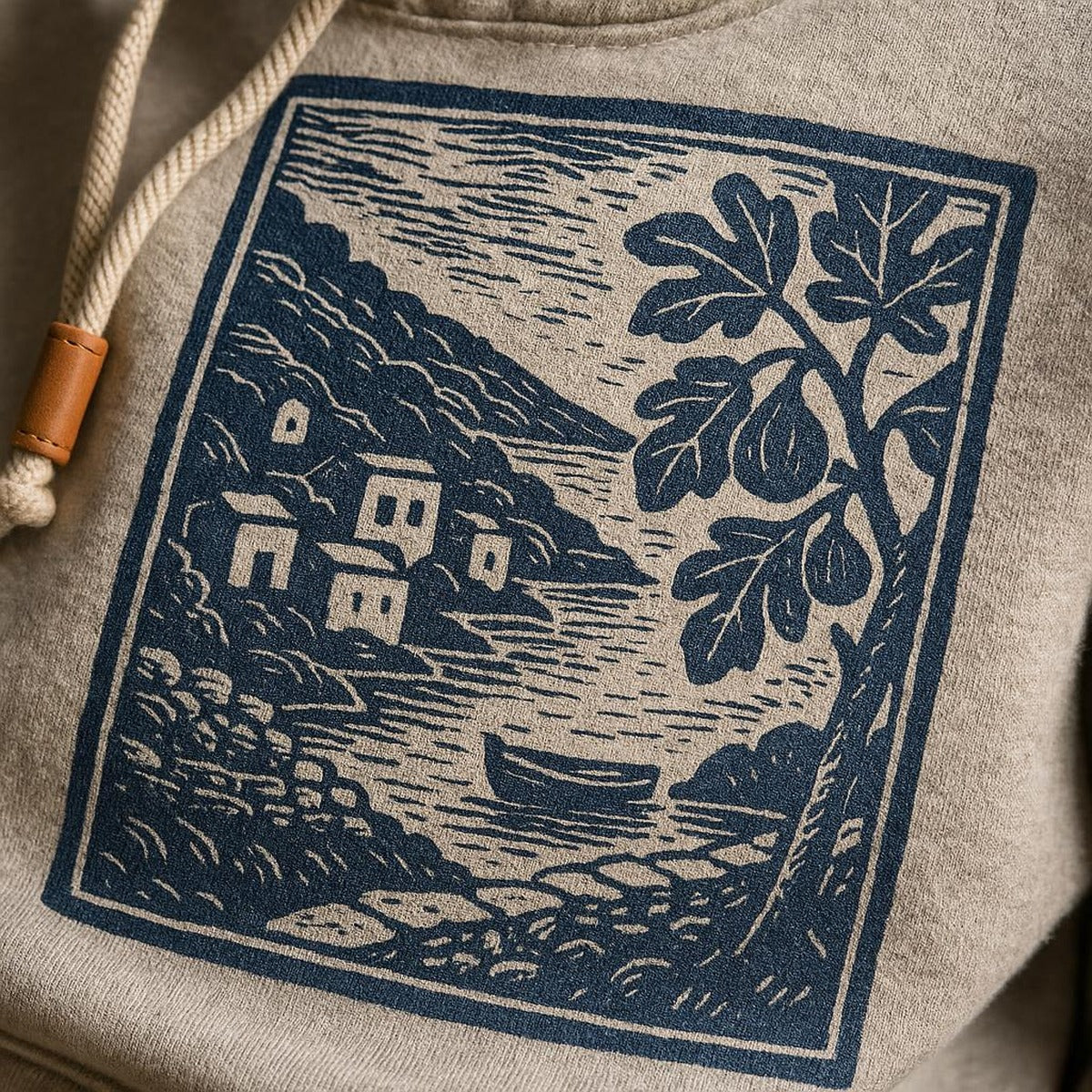 Close-up of the brushed fleece texture and soft fig-toned print detail