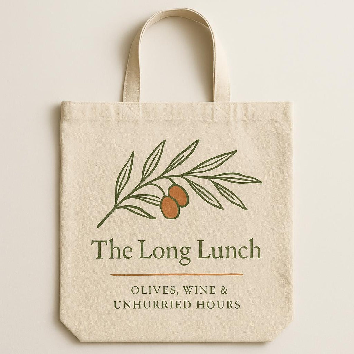 Full-length view showing the tote's long shoulder handles and generous proportions against a neutral wall