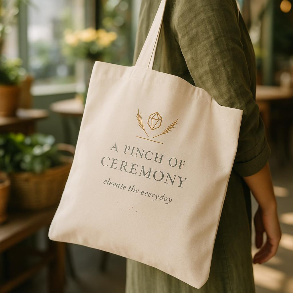 Tote bag shown filled with fresh produce and bread to display its roomy size