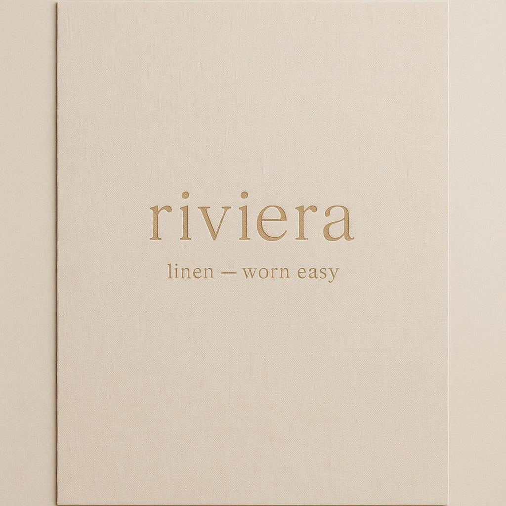 Flat lay of the unframed premium poster on a linen surface showing crisp print edges and warm neutral palette