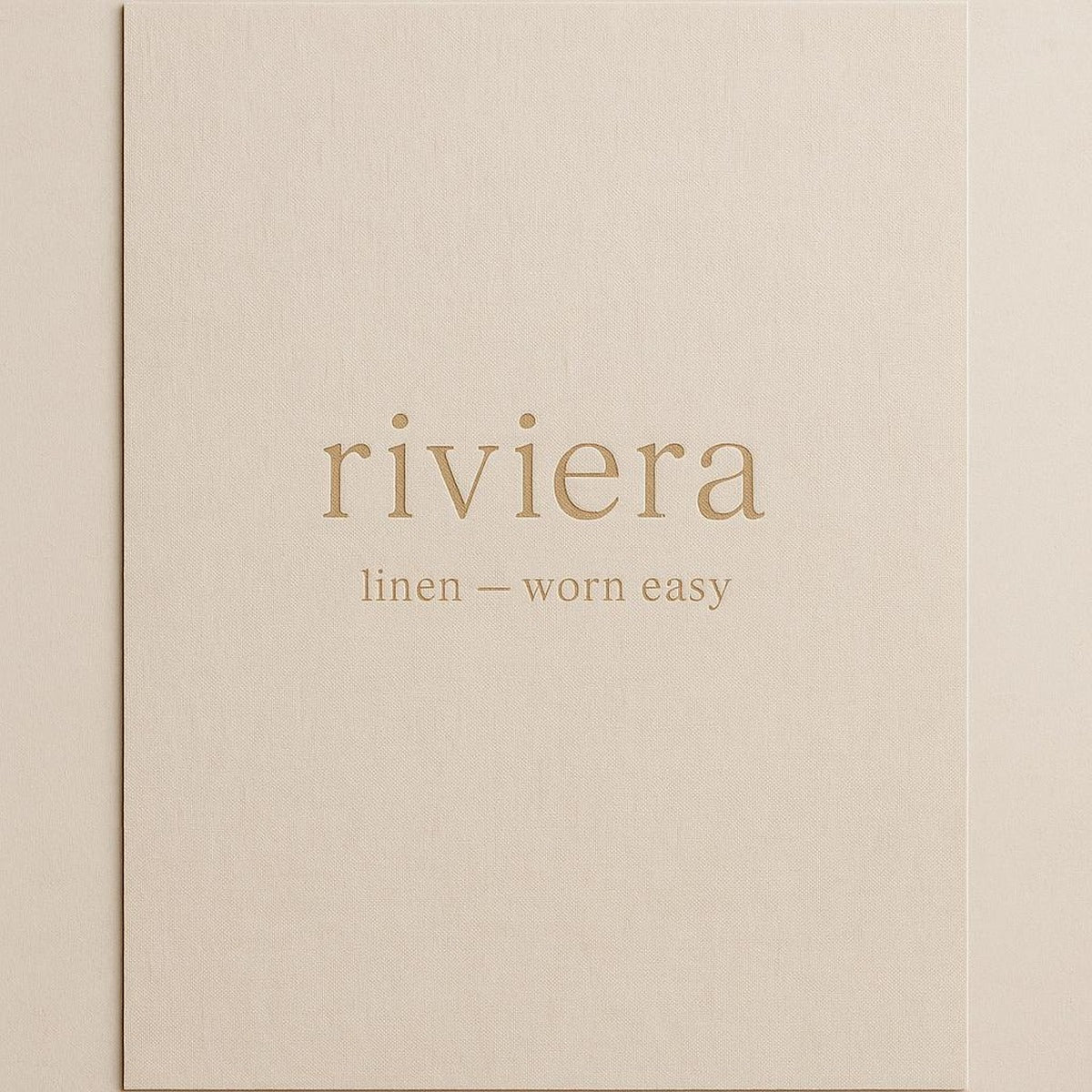 Flat lay of the unframed premium poster on a linen surface showing crisp print edges and warm neutral palette