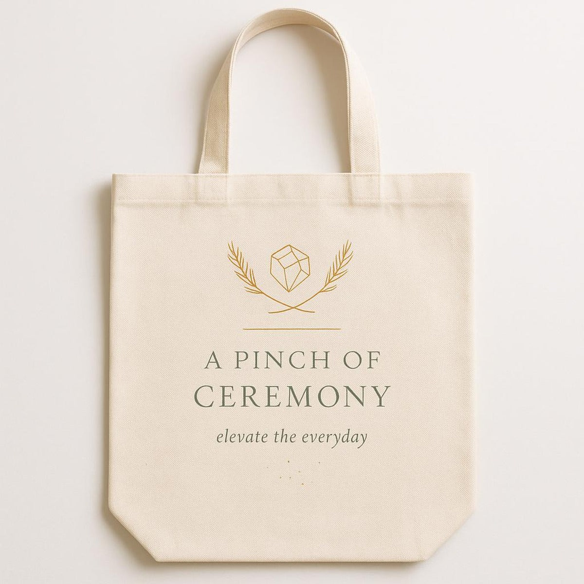 Natural cotton canvas tote bag printed with an illustration of a stoneware salt cellar and olive wood spoon