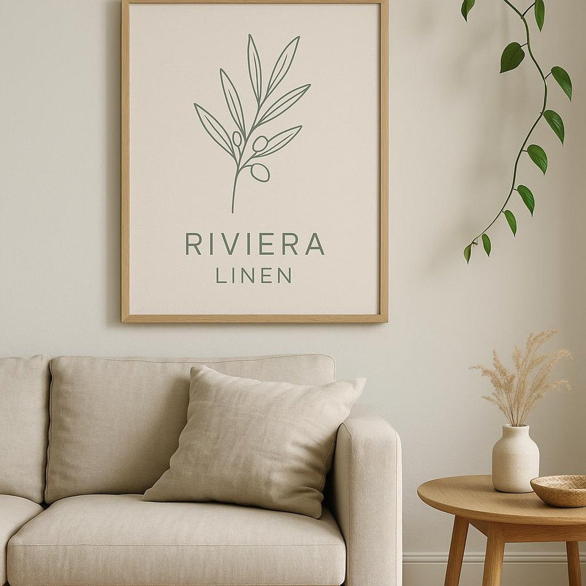 Framed Riviera linen shirt art print hung above a rattan dresser in a sunlit coastal bedroom