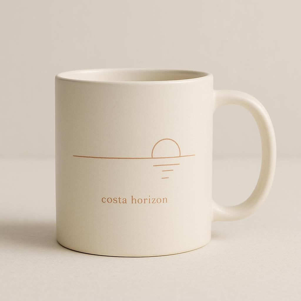 Overhead view of the mug filled with black coffee showing the rim and printed motif
