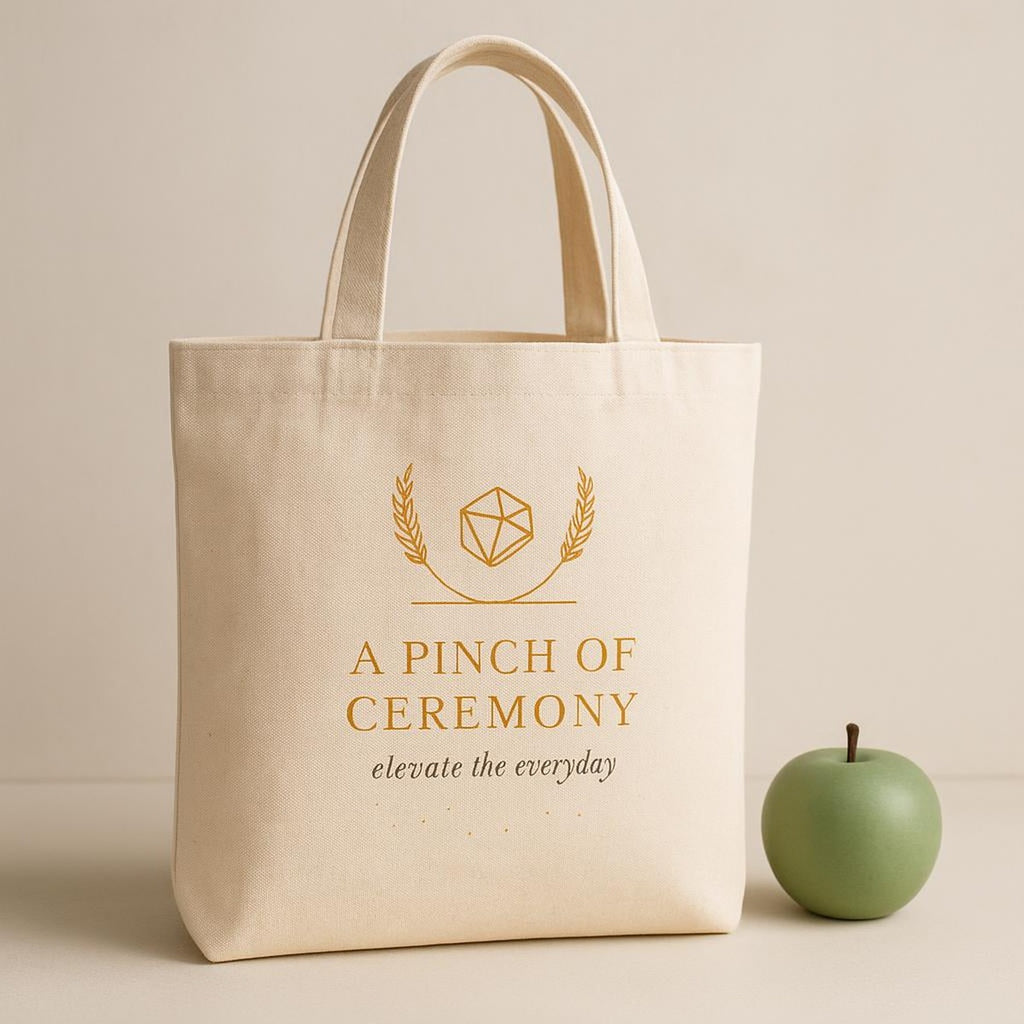 Detail of double-stitched cotton handles and hemmed top edge of the tote bag