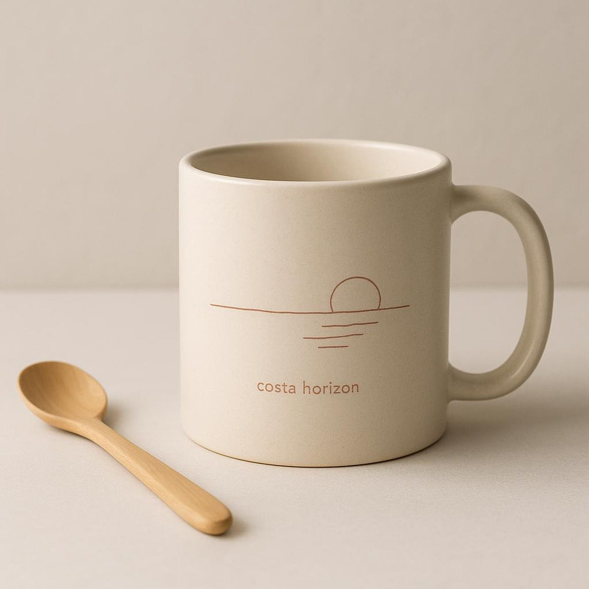 Hand holding the 11oz ceramic mug to show its comfortable size and C-shaped handle