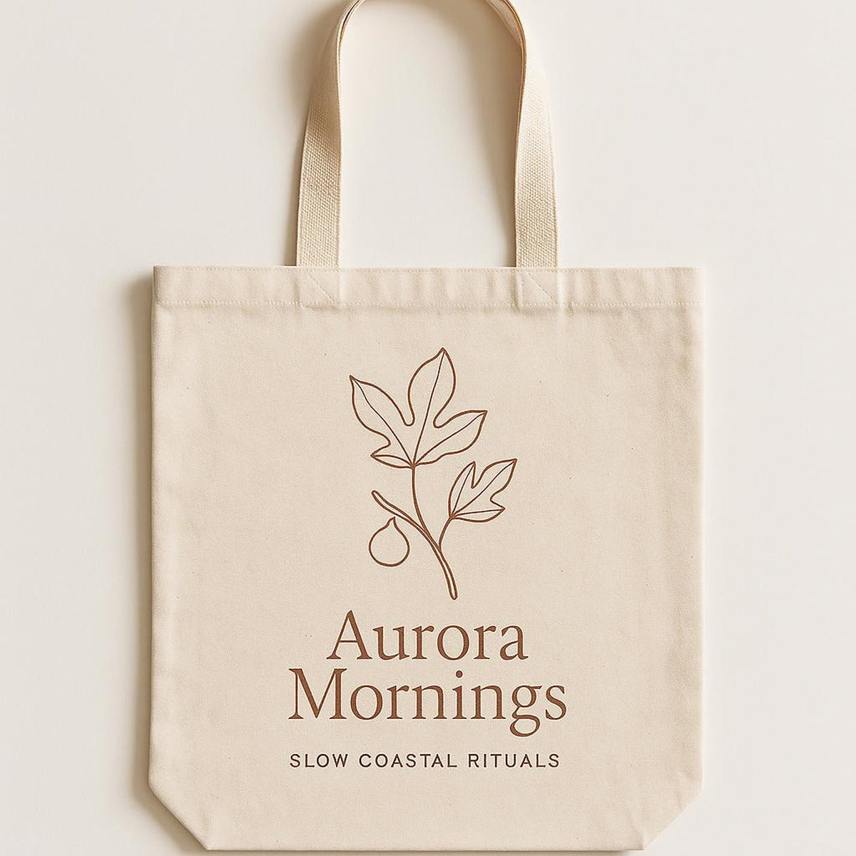 Flat-lay of the folded canvas tote showing handle length and overall dimensions