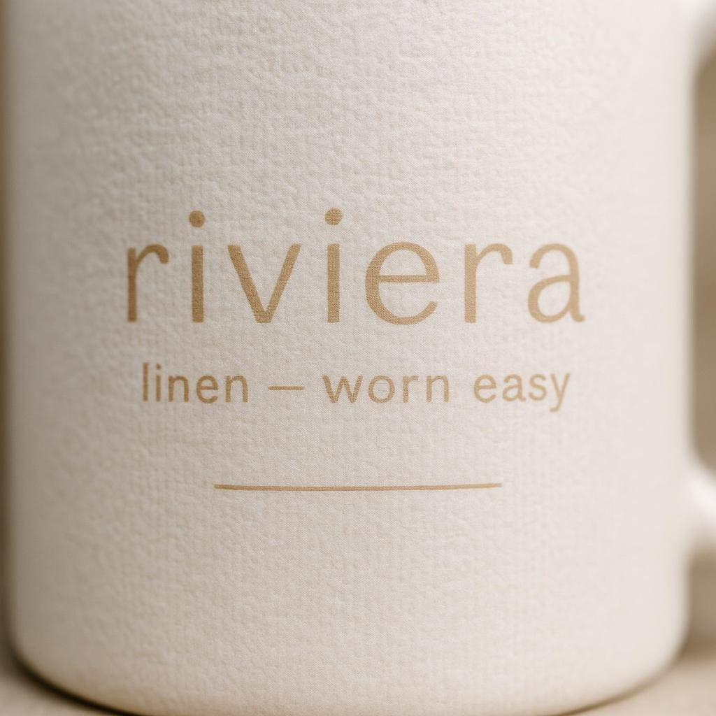 Close-up of the stonewashed linen texture and drawstring detail on the mug glaze
