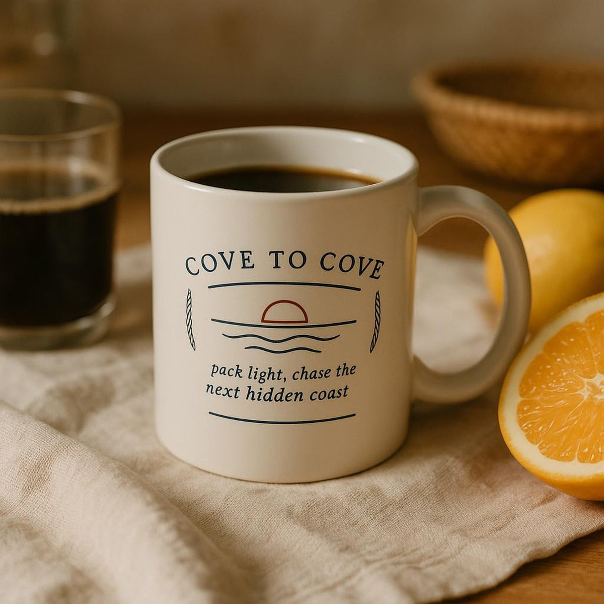 Coastal ceramic mug filled with coffee on a sunlit café table by the harbour